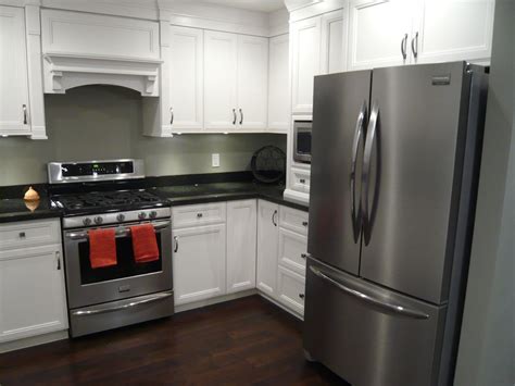 images of white cabinets stainless steel appliances dark granite|black countertops with white appliances.